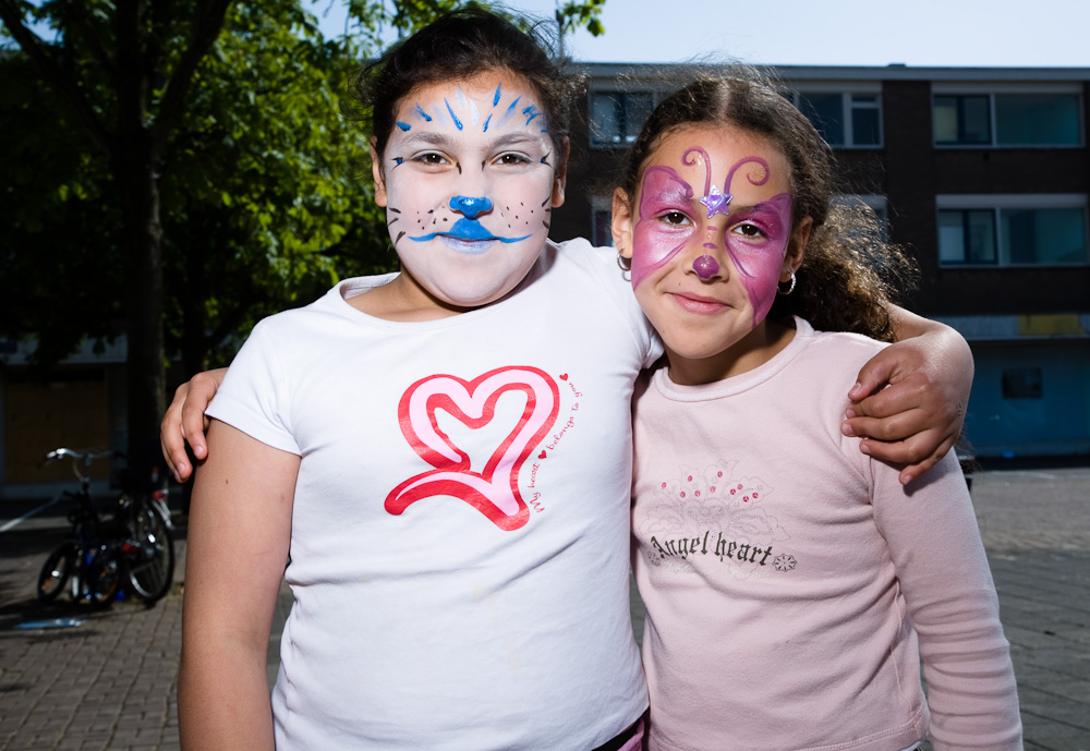 two girls with painted faces